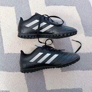 Adidas Kids Turf sneakers with Black and White Stripes